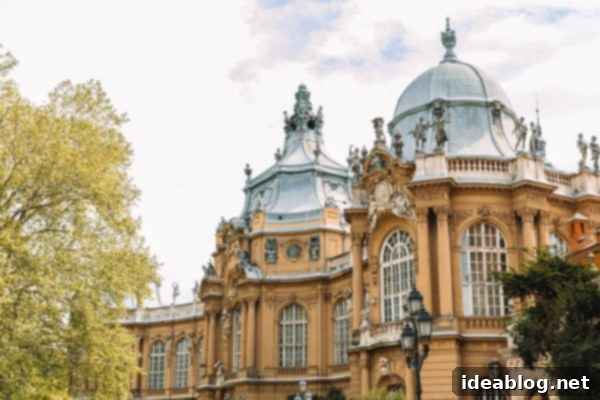 Budapest Travel Guide - with recommendations on must-visit destinations, where to stay, and where to eat in the region. #travel #budapest #travelguide Vajdahunyad Castle reflected in a tranquil lake in City Park