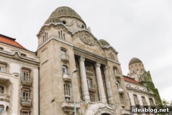Budapest Travel Guide - with recommendations on must-visit destinations, where to stay, and where to eat in the region. #travel #budapest #travelguide Interior of Gellert Bath with intricate tile work and columns