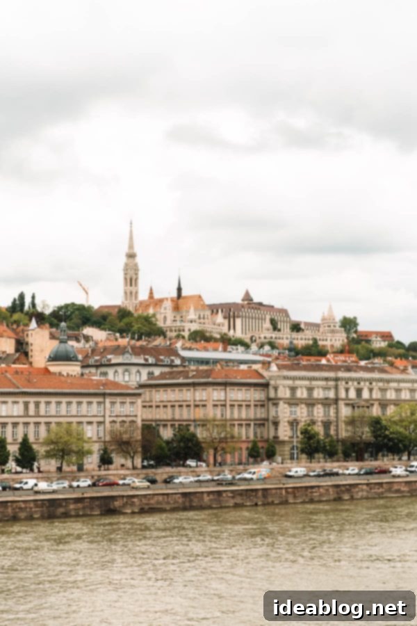 Budapest Travel Guide - with recommendations on must-visit destinations, where to stay, and where to eat in the region. #travel #budapest #travelguide Historic architecture on the Buda side of Budapest, Hungary