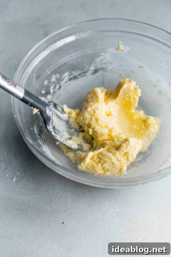 The Art of Cultured Butter 7 A bowl of clear water after repeated washing of homemade butter, signifying all buttermilk has been successfully removed.