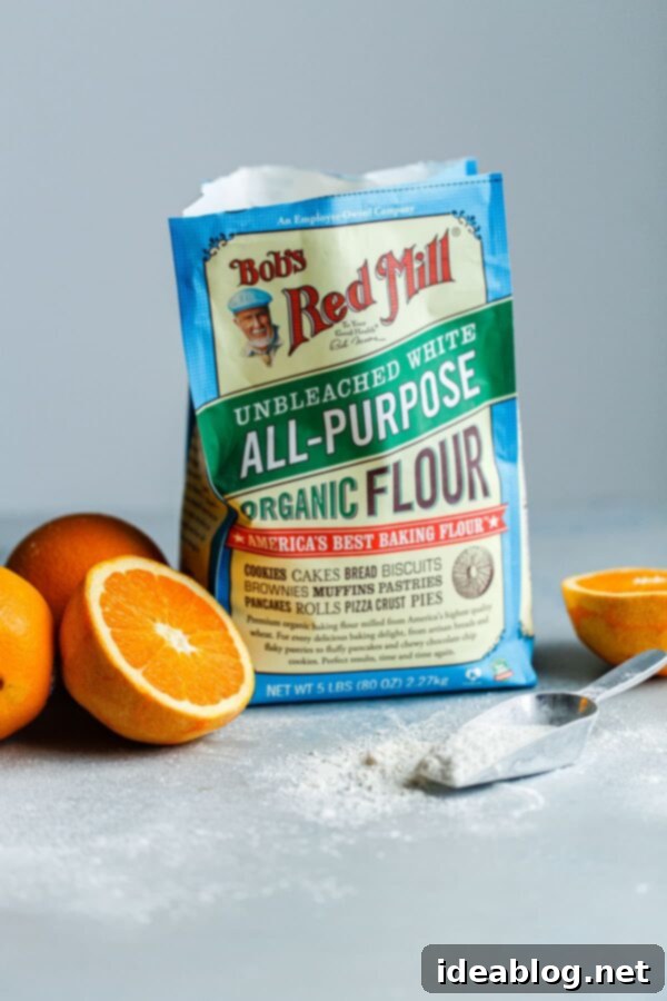 Orange Bundt Cake with Chocolate Glaze - Featuring high-quality Bob's Red Mill flour for the perfect bake. Bobs Red Mill Organic Unbleached All Purpose Flour - A bag of Bob's Red Mill Organic Unbleached All-Purpose Flour, a key ingredient for this bundt cake.