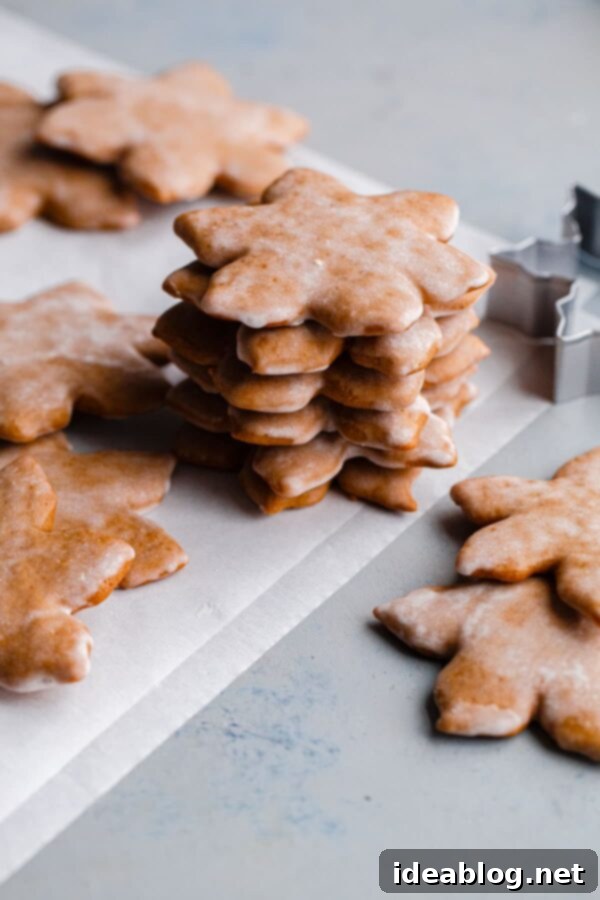 German Lebkuchen Cookies - traditional glazed German Christmas cookies made with warming spices, for a festive treat to enjoy around the holiday season! Stacked Lebkuchen Cookies