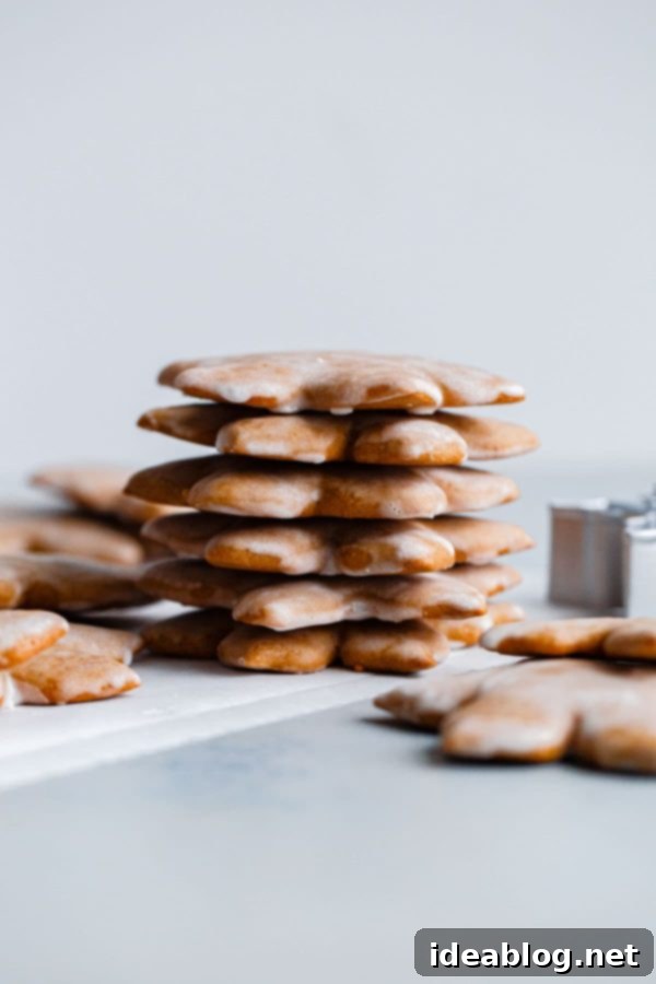 German Lebkuchen Cookies - traditional glazed German Christmas cookies made with warming spices, for a festive treat to enjoy around the holiday season! stacked lebkuchen