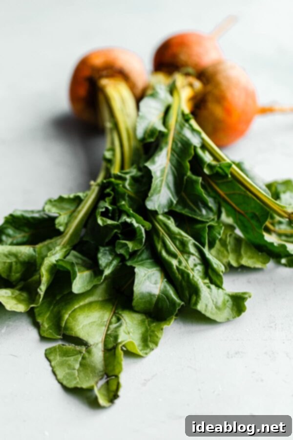 How to Cook Beet Greens - this simple sautéed beet greens recipe calls for just extra virgin olive oil, fresh garlic, red pepper flakes, and lemon zest to produce hearty, healthy greens. #abeautifulplate #beets #vegetarian #vegan #glutenfree #dairyfree #abeautifulplate #howto Yellow Beet Greens