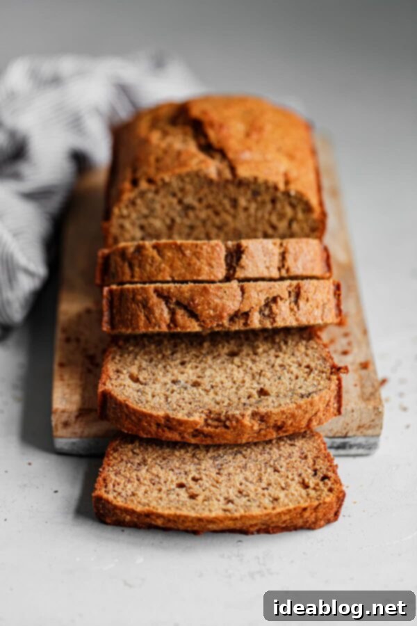 Easy HEALTHIER Banana Bread - An easy healthier banana bread recipe made with whole grain flour (all purpose will also work in a pinch!) and maple syrup for a touch of sweetness. #abeautifulplate #bananabread #easyrecipe #quickbread #recipe Easy Healthier Banana Bread