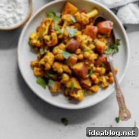 One-Pan Cauliflower Curry with Refreshing Raita 4 Sheet Pan Cauliflower Curry with Raita