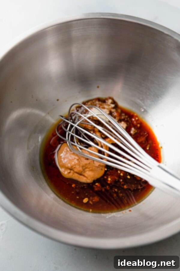 Fiery Peanut Noodles with Cool Cucumber 4 Spicy Peanut Noodle Sauce Ingredients in Bowl