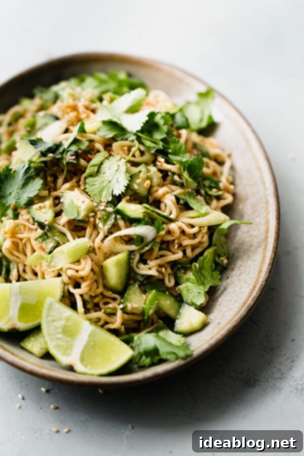 Fiery Peanut Noodles with Cool Cucumber 9 Spicy Peanut Noodles on Plate with Chopsticks