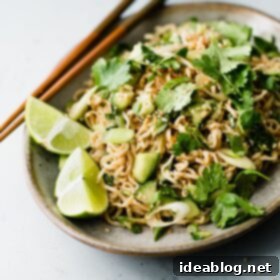Fiery Peanut Noodles with Cool Cucumber 10 Spicy Peanut Noodles on Plate with Chopsticks