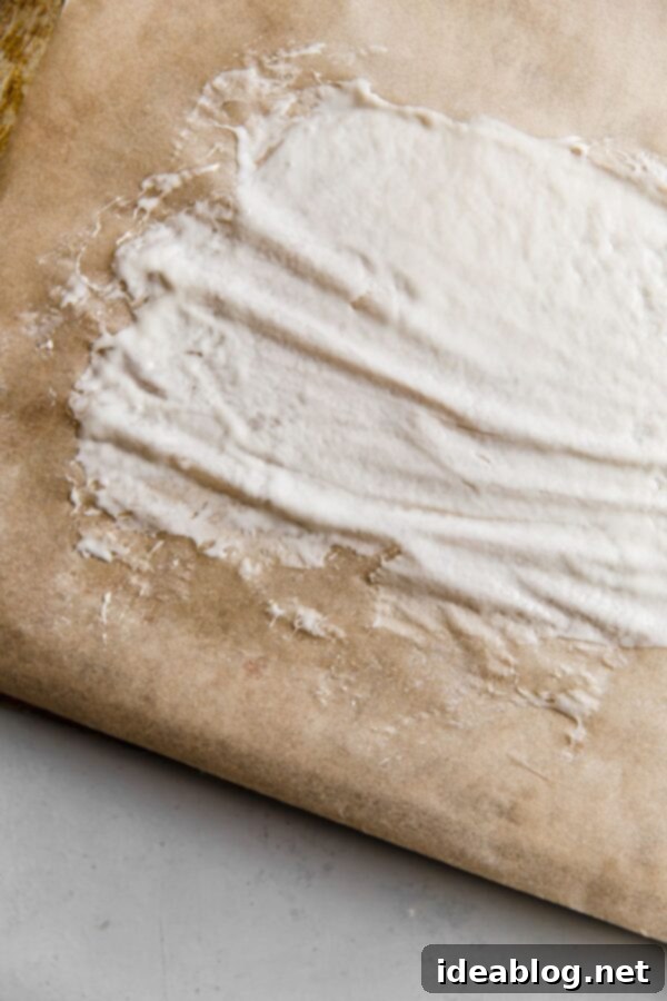 Ekşi Maya Kurutma ve Saklama Yöntemleri 9 thinly spread sourdough starter on parchment paper