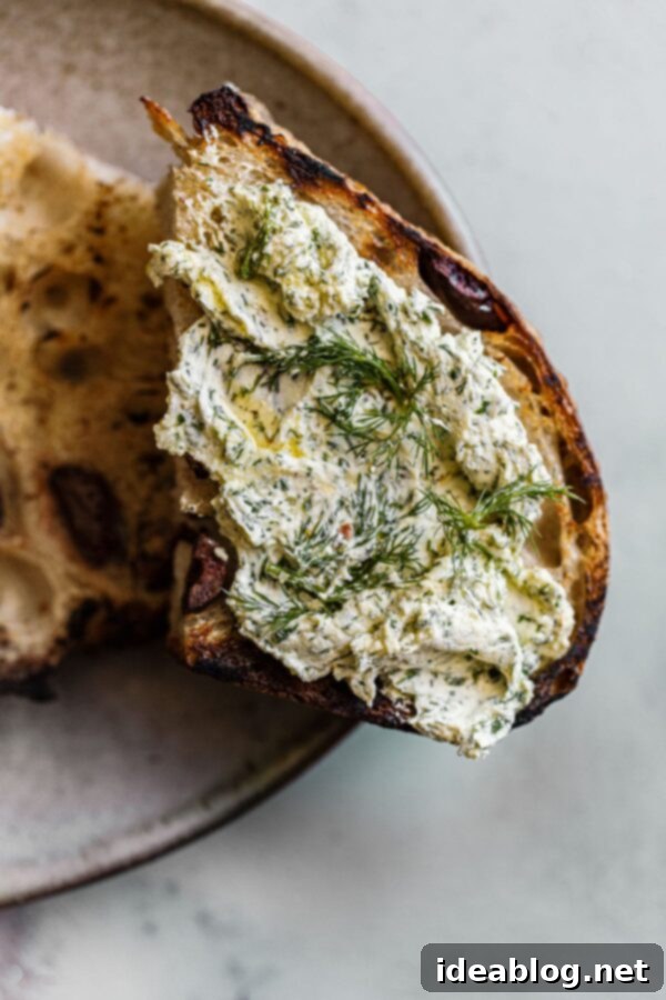 Whipped Garlic Herb Goat Cheese 4 Garlicky Dill Goat Cheese Spread generously applied on toasted sourdough bread