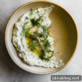 Whipped Garlic Herb Goat Cheese 8 Garlicky Herbed Goat Cheese Spread in Ceramic Bowl