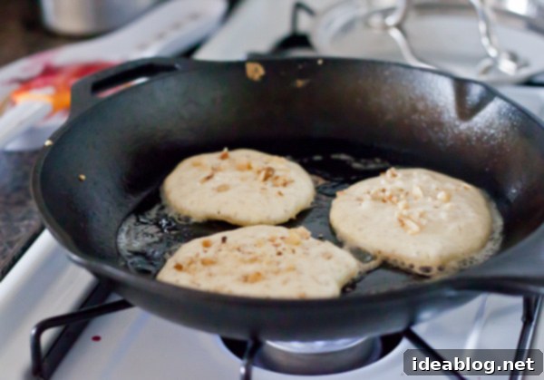 Golden Minis with Blackberry Bliss 3 Process of making Silver Dollar Pancakes on a griddle