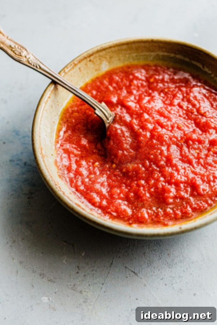 Perfect Homemade Pizza Sauce 2 Homemade Pizza Sauce in Bowl with Spoon