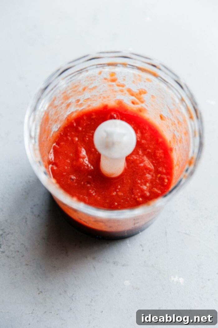 Perfect Homemade Pizza Sauce 5 Pureed Canned Tomatoes in Food Processor Bowl