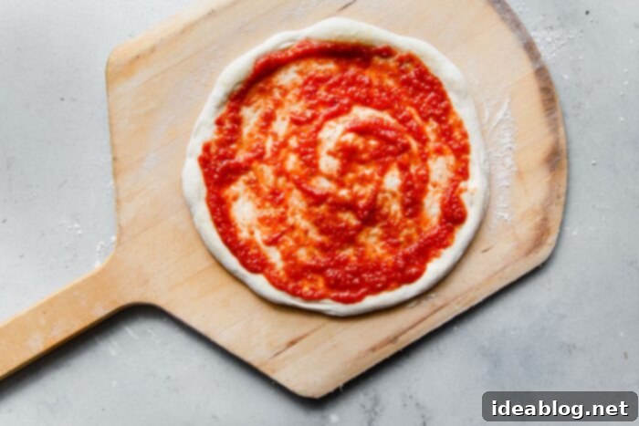 Perfect Homemade Pizza Sauce 8 Homemade Pizza Sauce Spread on Pizza Dough on a Pizza Peel