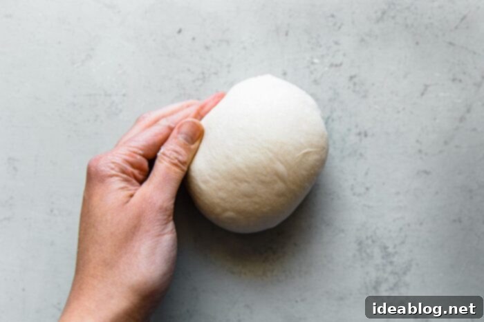 Artisan Sourdough Pizza Dough 14 Shaping Pizza Dough into Rounds