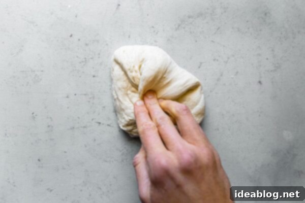 Artisan Sourdough Pizza Dough 37 Shaping Pizza Dough into Rounds