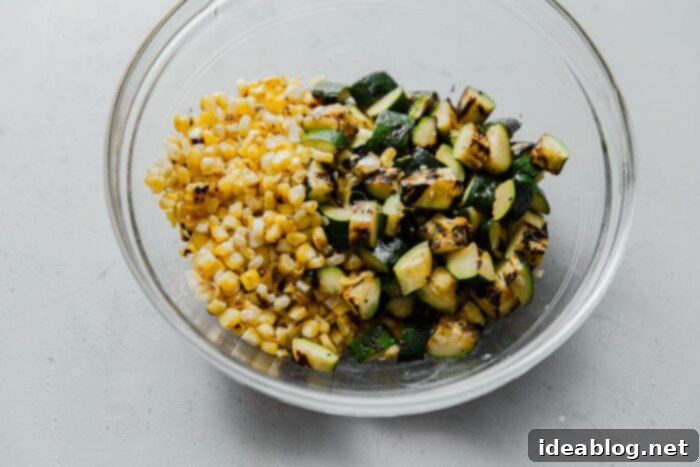 Charred Summer Vegetables Pistachio Pesto Pasta with Pecorino 5 Grilled Corn and Zucchini in Bowl