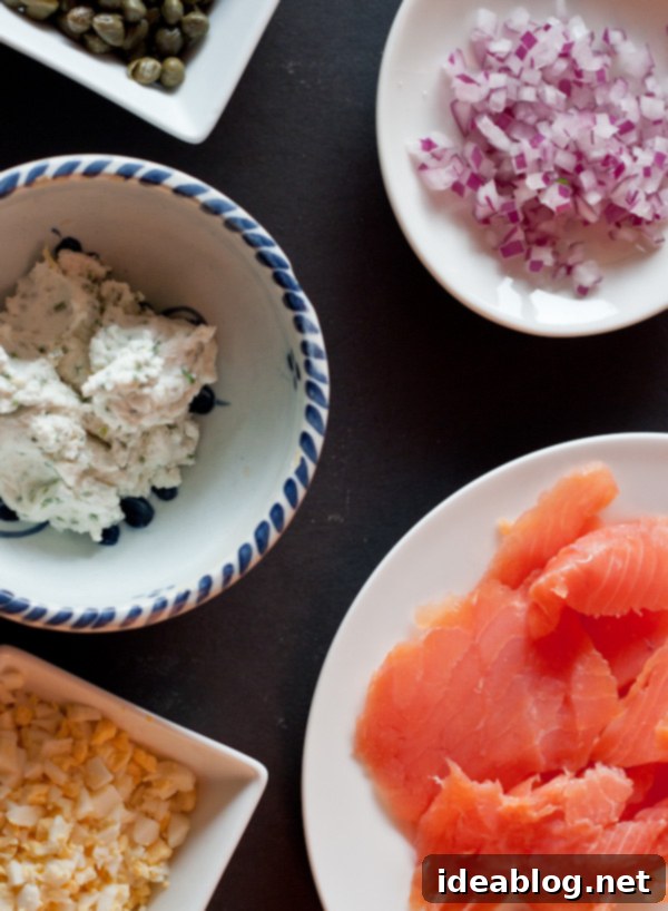 Smoked Salmon & Potato Tartine 4 Ingredients for Smoked Salmon Potato Tartine: salmon, capers, goat cheese, eggs, onions, chives, lemon