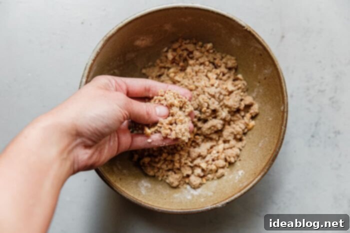 Rustic Raspberry Hazelnut Crumb Bake 8 A bowl filled with the prepared hazelnut crumb topping, ready to be chilled.