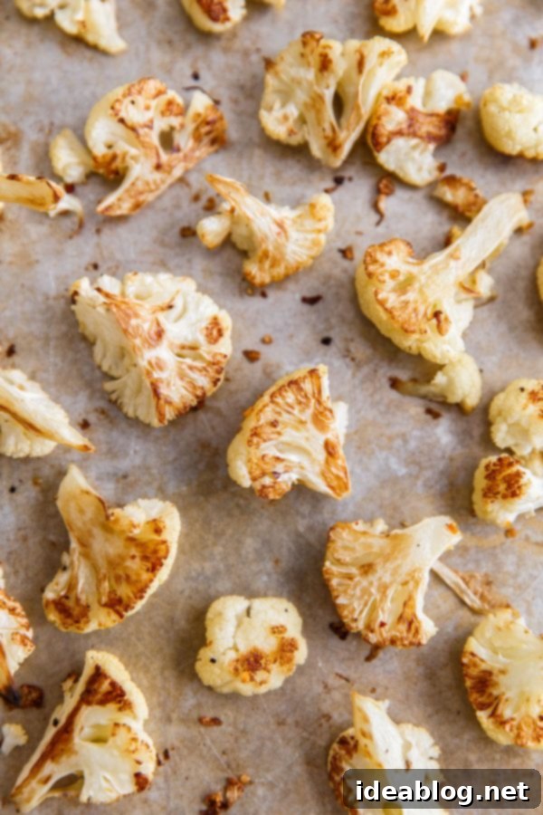 Golden Roasted Cauliflower with Zesty Tahini Mint Drizzle 3 Perfectly roasted cauliflower florets, golden brown and tender
