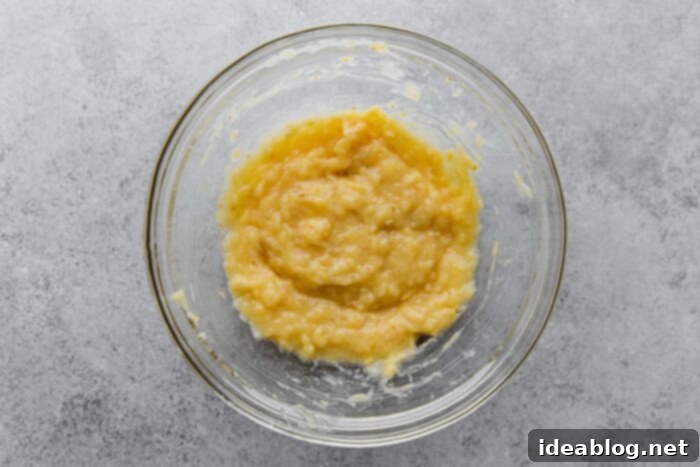 Ultimate Moist Banana Bread 7 Bowl of thoroughly mashed, extra ripe bananas, ready for mixing into banana bread batter