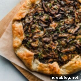 Rustic Mushroom Tart 4 Mushroom Galette with Blue Cheese on Cutting Board