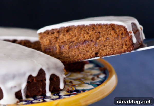 Spiced Ginger Tea Cake 5 Gingerbread Tea Cake with Raspberry Jam and Lemon Glaze, ready to be served
