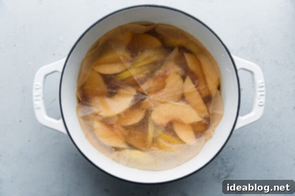 Silken Poached Quince 15 Cartouche Covered Poached Fruit