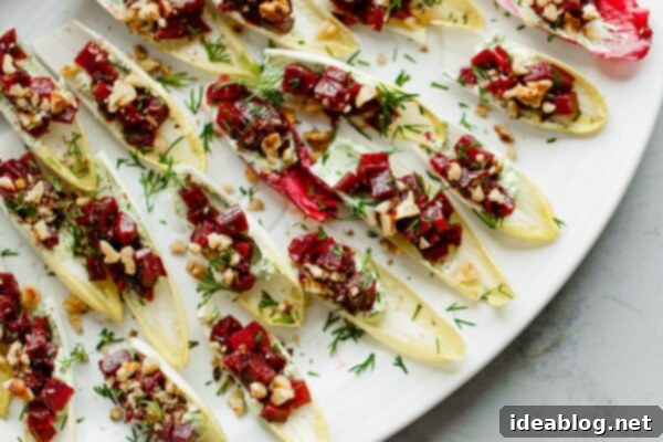 Zesty Beet and Goat Cheese Endive Boats 13 Beet and Goat Cheese Endive Bites - final presentation
