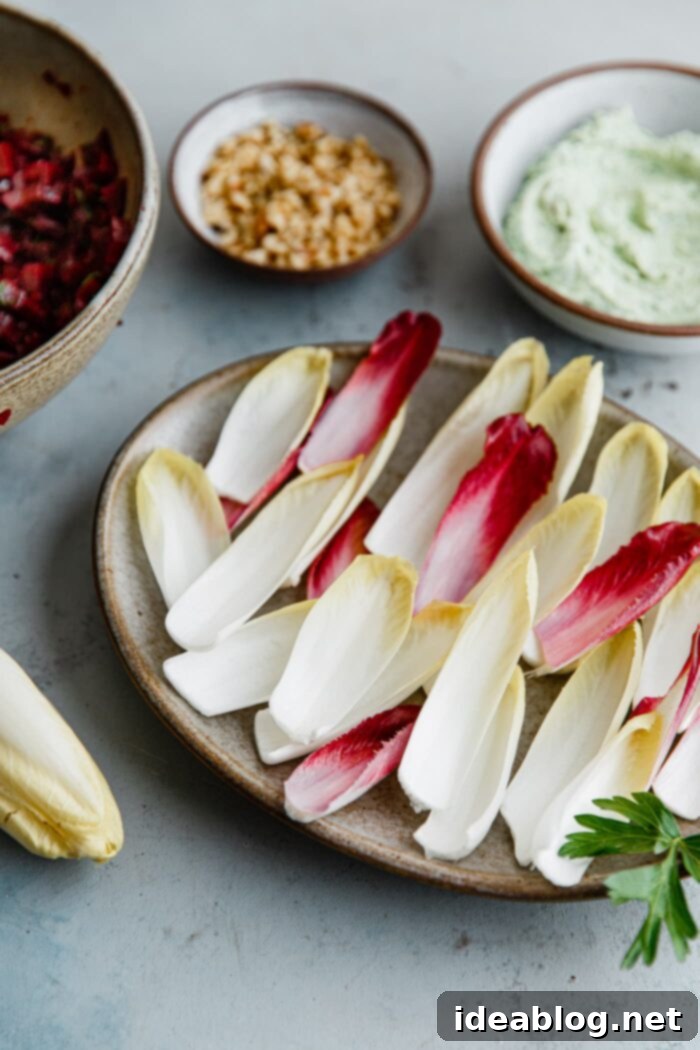 Zesty Beet and Goat Cheese Endive Boats 5 Close-up of endive bite ingredients