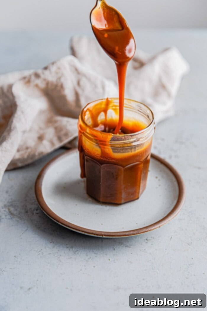 Spirit Infused Caramel Indulgence 8 Salted Bourbon Caramel Sauce drizzled over a dessert