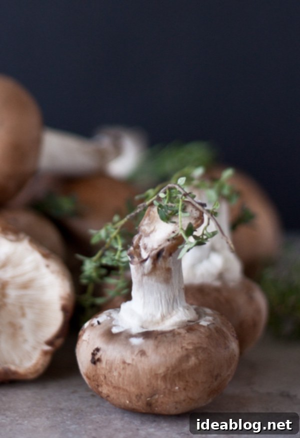 Easy 30-Minute Beef Bourguignon 4 Sautéed mushrooms and fresh thyme, key ingredients for a flavorful bourguignon sauce