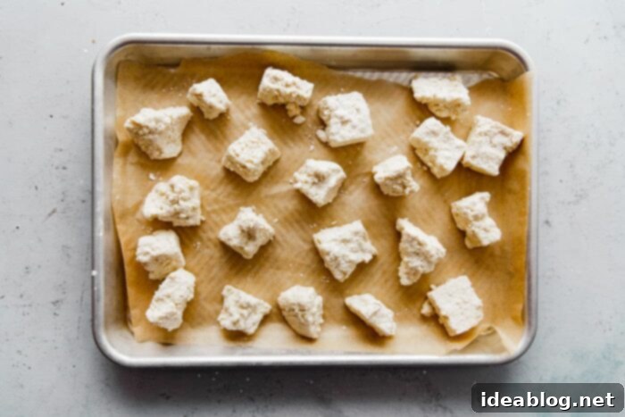 Spicy Peanut Crunch Tofu 9 Cornstarch Tofu on Parchment Lined Baked Sheet