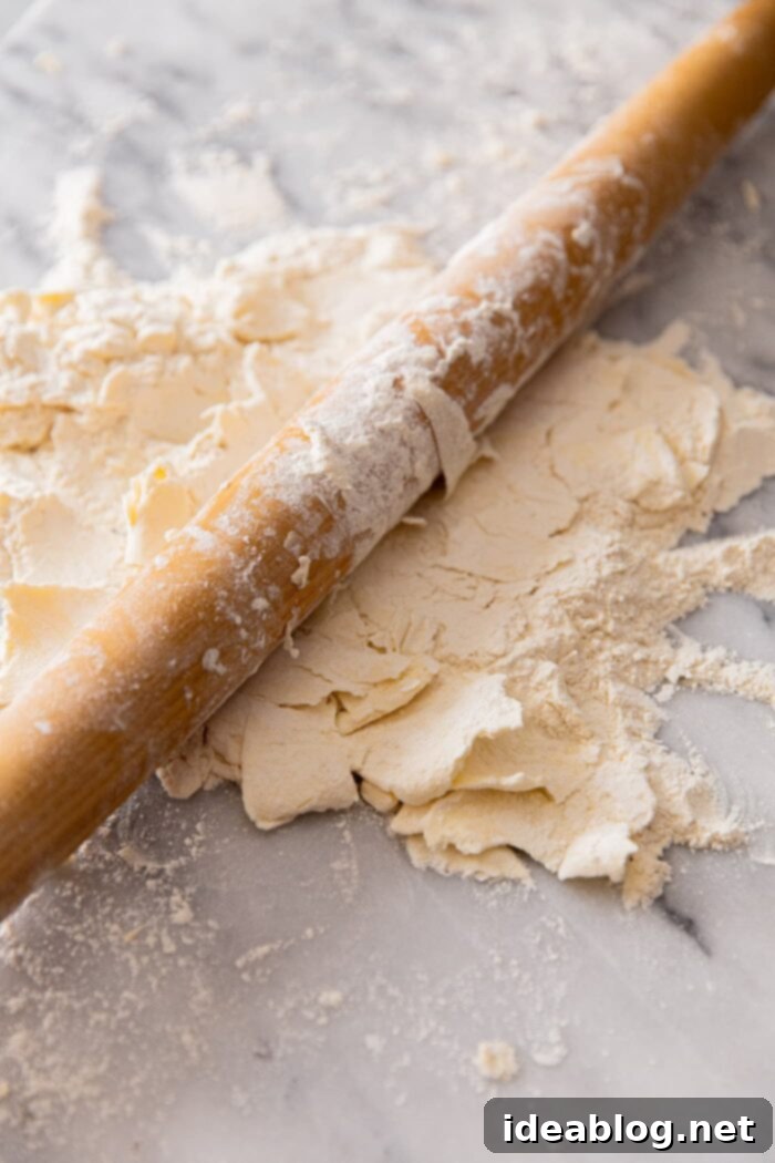 Ultimate Flaky Quiche Pastry 5 Rolling Butter into Flour for Quiche Crust