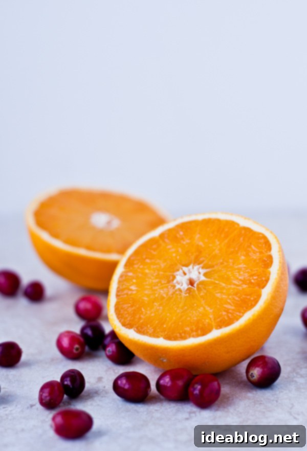 Sweet and Tangy Cranberry Raisin Tart 4 Fresh oranges and cranberries, key ingredients for the tart filling.