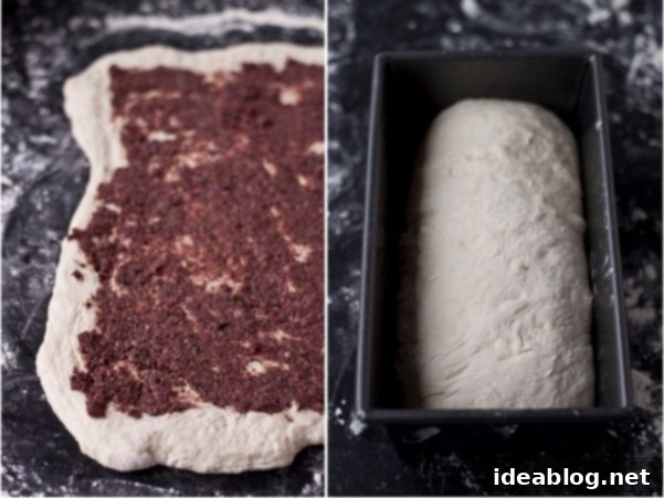 Artisan Olive Tapenade Swirl Bread 6 Bread dough being rolled out and spread with olive tapenade for swirling