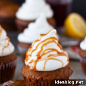 Pomegranate-Kissed Gingerbread Clouds 9 Gingerbread Cupcakes with Marshmallow Frosting and Pomegranate Caramel