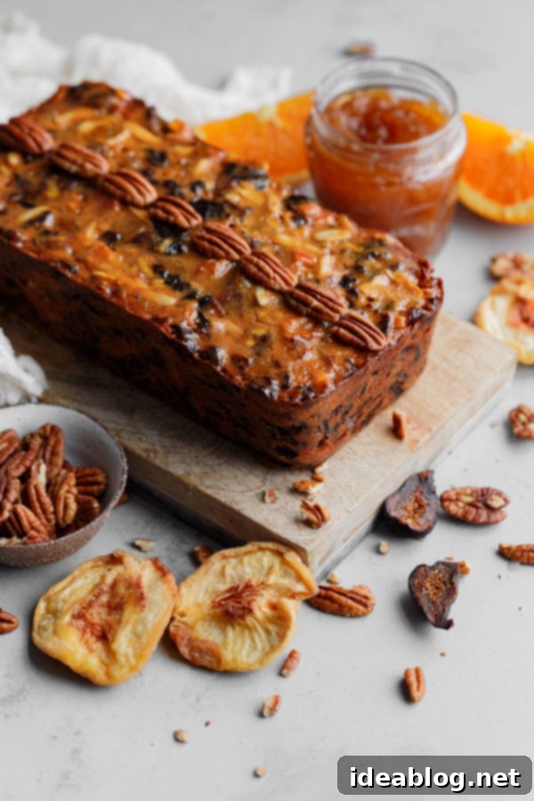 A traditional moist fruit cake made with rum soaked dried fruit, citrus zest, and candied ginger. The best fruit cake recipe you’ll ever make! #abeautifulplate #holiday #christmas #fruitcake #cake #recipe Best Fruit Cake without Candied Fruit