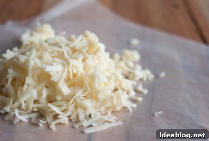 Creamy Polenta Bake with Southern Greens 3 Freshly grated sharp white cheddar cheese, a key ingredient for a rich flavor