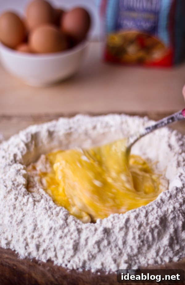 Mastering Homemade Agnolotti 3 Close-up of freshly made homemade pasta dough, smooth and elastic.