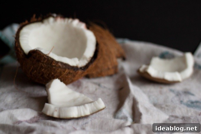 Vanilla Coconut Lemongrass Escape 4 Close-up of fresh whole coconut pieces, ready for use