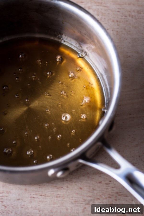 How to Make Spun Sugar: Essential Caramel Preparation for Beautiful Dessert Decor #spun_sugar #caramel #dessert_garnish #howto #recipe #baking_tips Preparing Caramel for Spun Sugar Garnishes